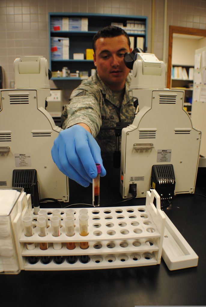 A Simple Blood Test May Flag Crohn’s and Colitis a Decade Before Symptoms A laboratory scientist analysing blood samples in test tubes