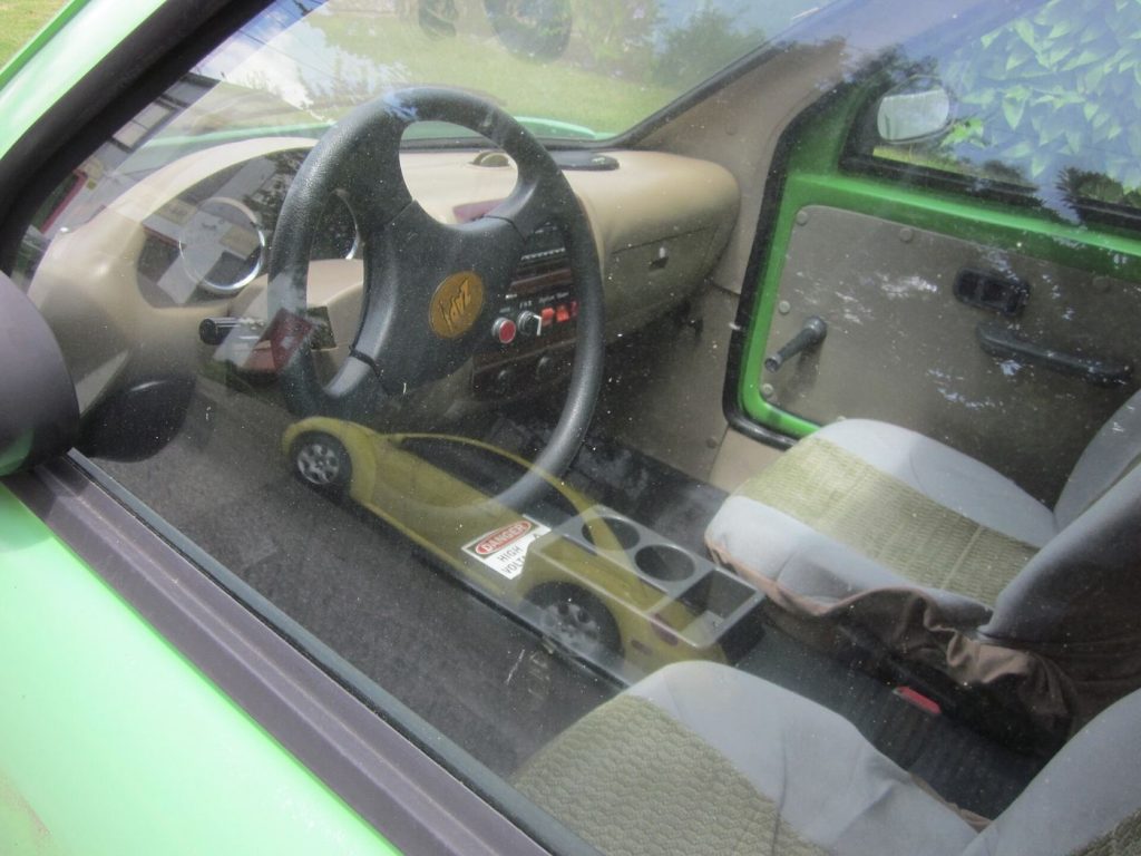 Electric Vehicles Gain Features Through Software Updates electric vehicle interior showing software dashboard display